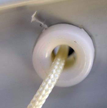 Close view of string grommet